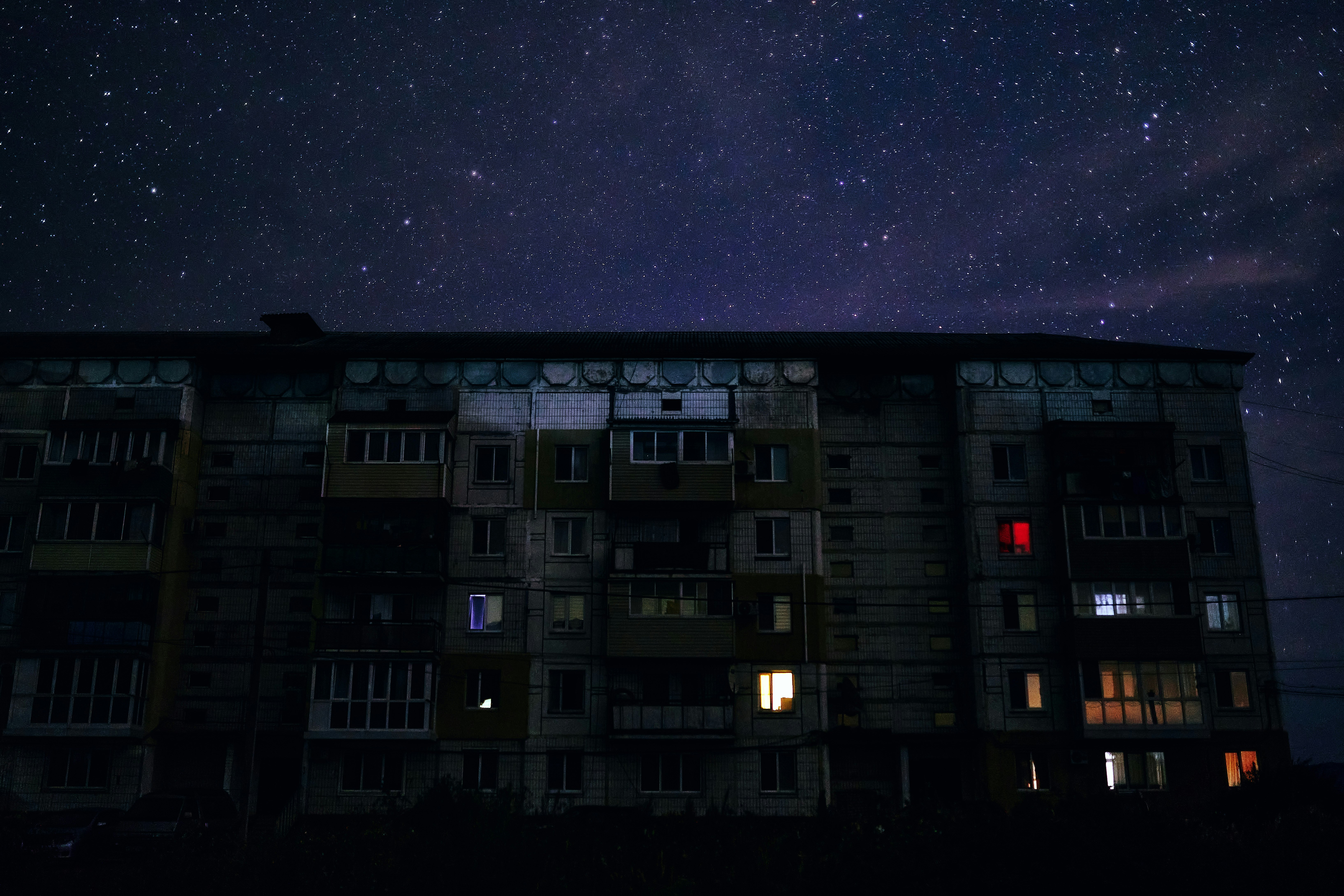 white and black concrete building under starry night